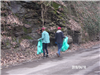 Volunteers Carrying Trash Bags