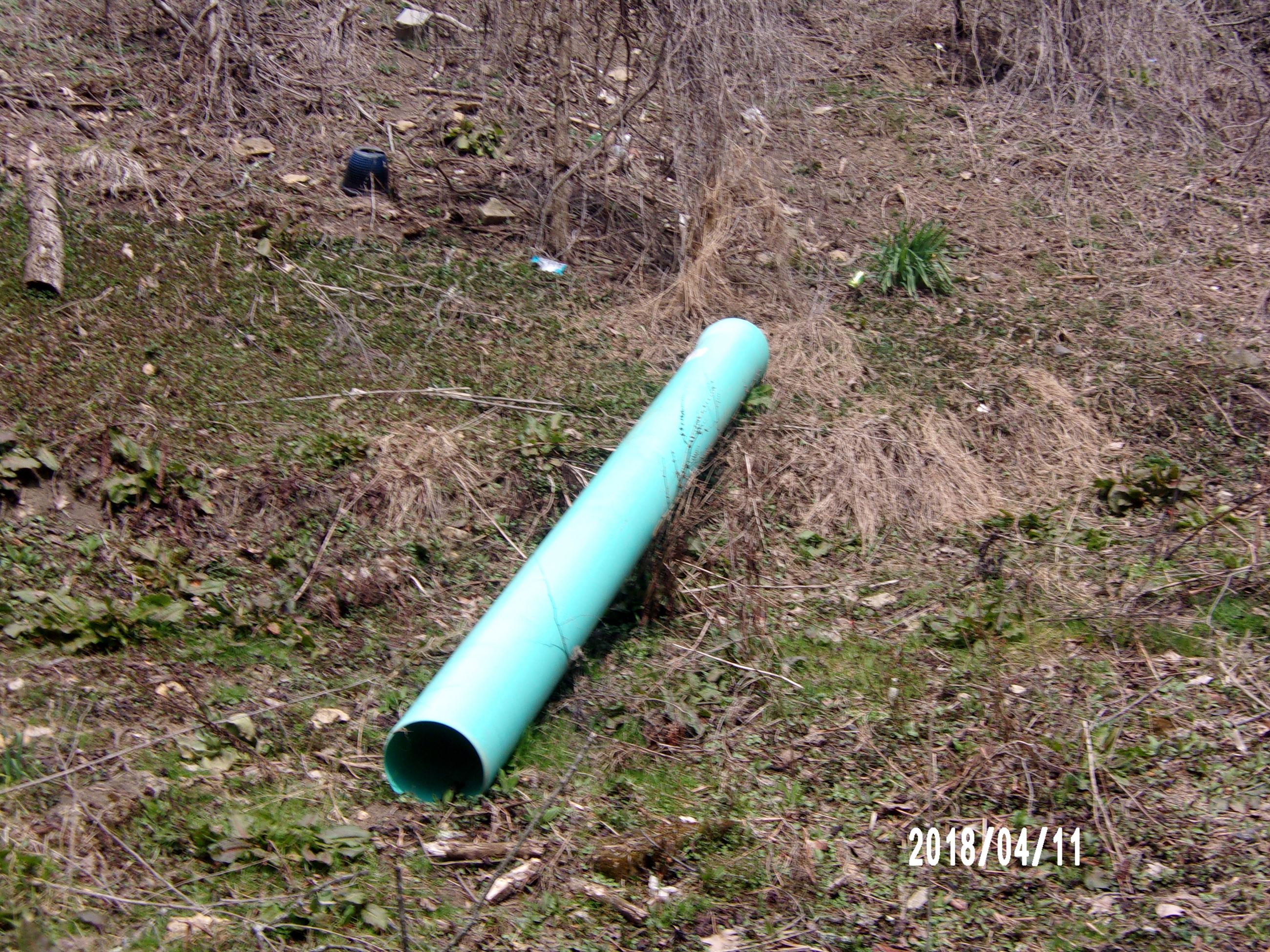 Blue Pipe Lying on Ground