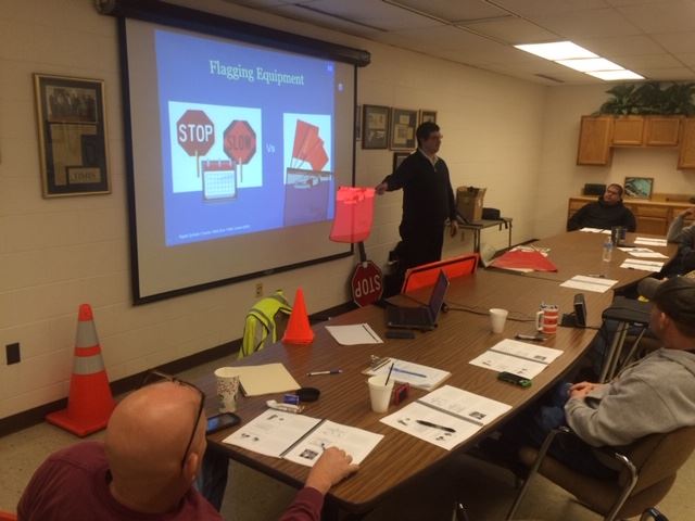 Man Doing Flagging Equipment Presentation